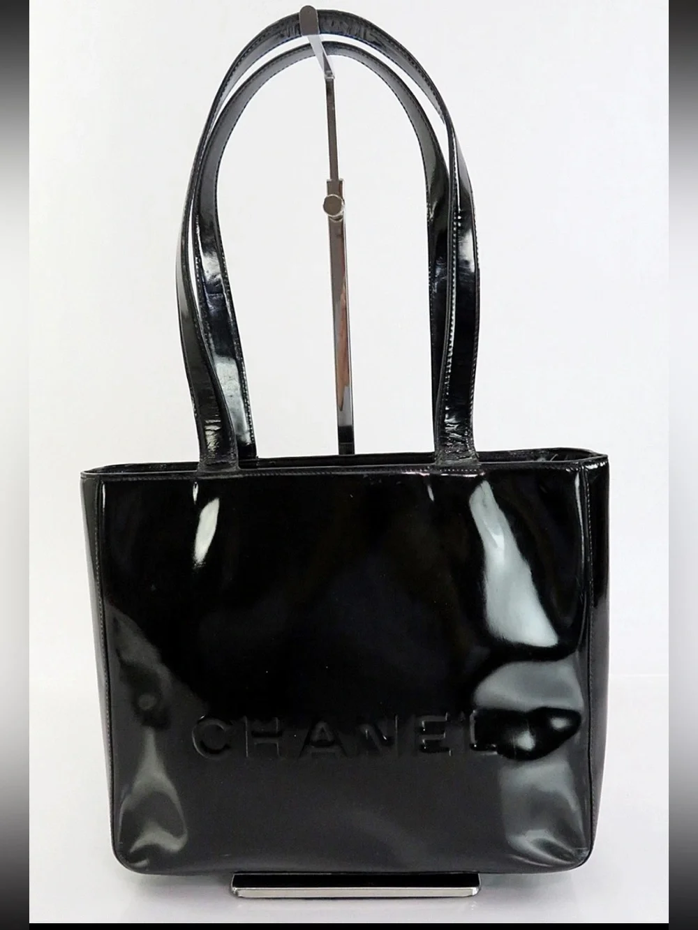 CHANEL Black Patent Tote with Embossed Logo